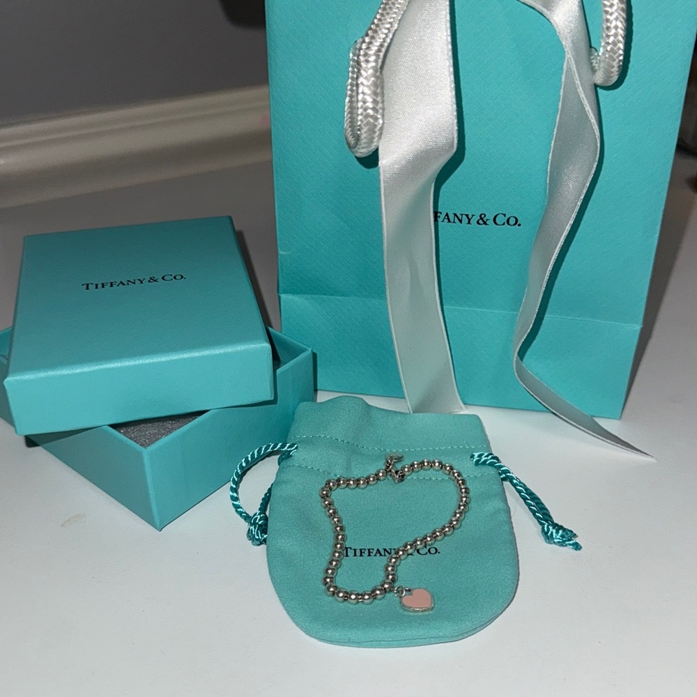 Tiffany & Co. Silver Bracelet with Pink Heart Charm